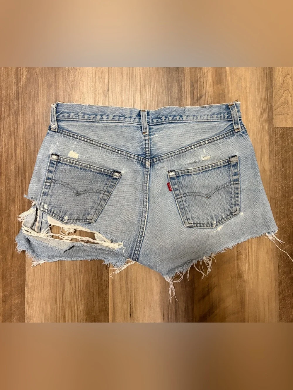 VINTAGE Levi's Light Wash Ripped Denim Shorts